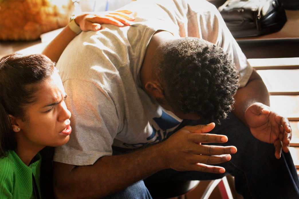 Woman Praying with Man